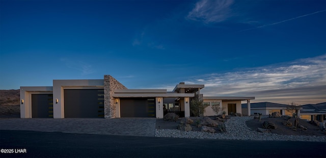 view of front of home with a garage