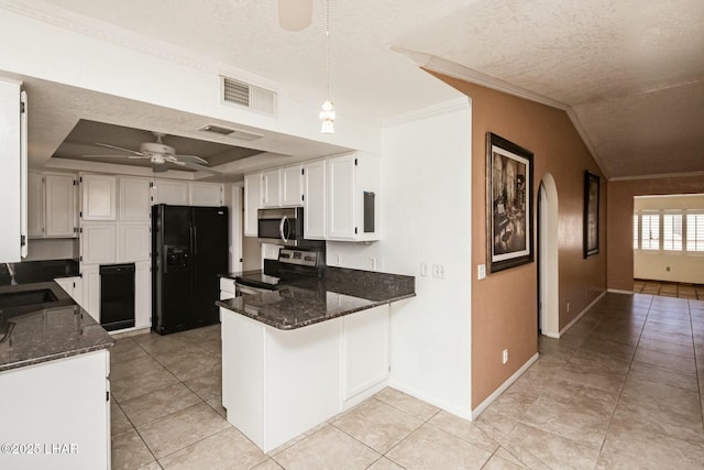 kitchen featuring black appliances, white cabinetry, dark stone counters, ceiling fan, and kitchen peninsula