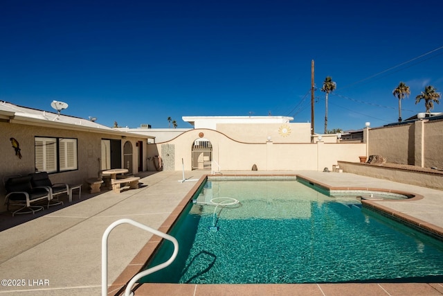 view of pool with a patio area