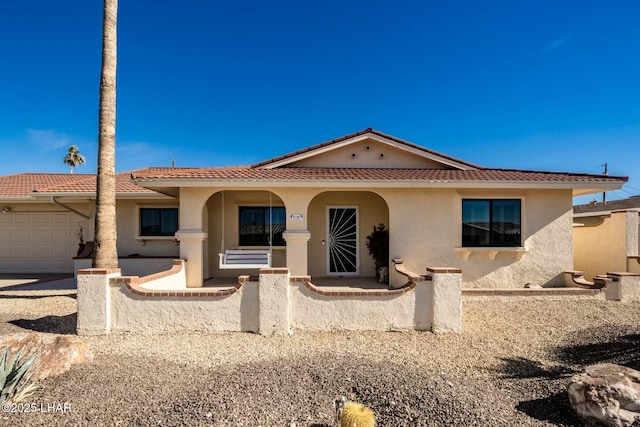 view of front of property featuring a garage