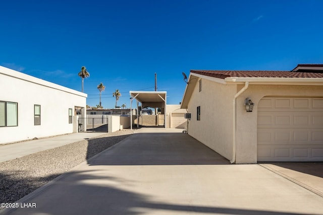 view of side of home with a garage