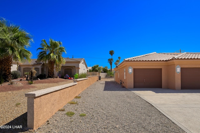 exterior space featuring a garage