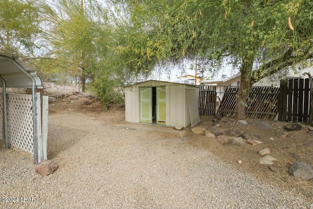 exterior space with a storage shed