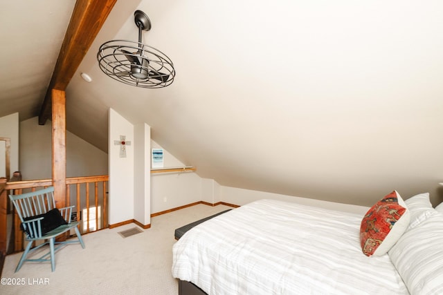bedroom with visible vents, lofted ceiling with beams, baseboards, and light carpet