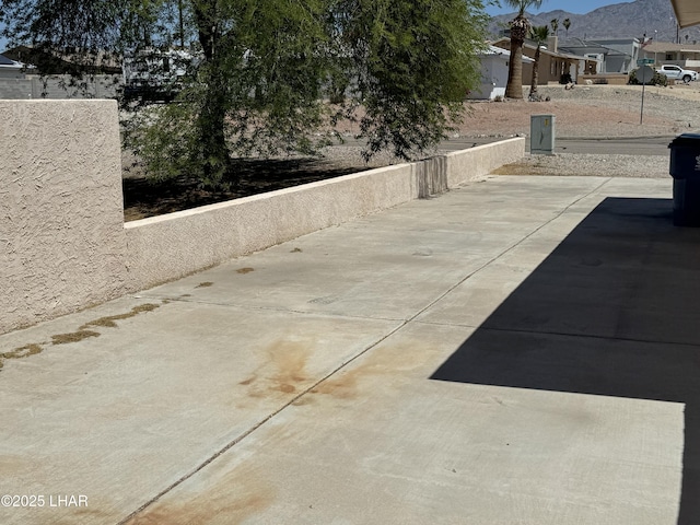 view of patio featuring a mountain view