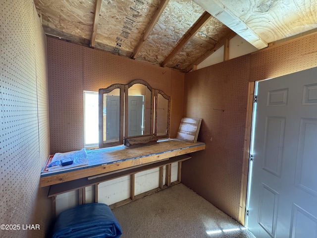 foyer entrance featuring lofted ceiling