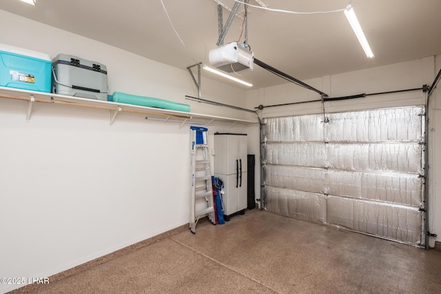 1650 S Smoketree Ave Unit 103, Lake Havasu City, AZ 86403 - garage with a garage door opener