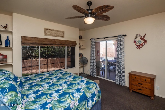 1650 S Smoketree Ave Unit 103, Lake Havasu City, AZ 86403 - carpeted bedroom with access to outside and ceiling fan