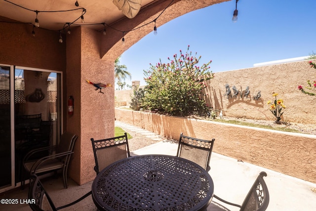 1650 S Smoketree Ave Unit 103, Lake Havasu City, AZ 86403 - view of patio / terrace featuring outdoor dining area