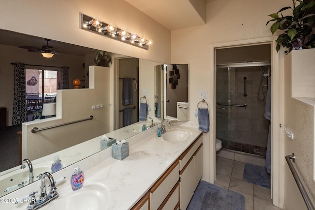 1650 S Smoketree Ave Unit 103, Lake Havasu City, AZ 86403 - bathroom with a stall shower, tile patterned floors, double vanity, and toilet