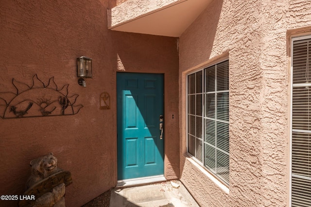 1650 S Smoketree Ave Unit 103, Lake Havasu City, AZ 86403 - doorway to property with stucco siding