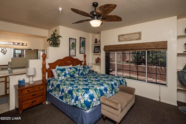 1650 S Smoketree Ave Unit 103, Lake Havasu City, AZ 86403 - carpeted bedroom featuring a textured ceiling, ceiling fan, and baseboards