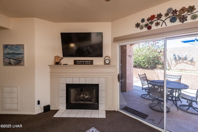 1650 S Smoketree Ave Unit 103, Lake Havasu City, AZ 86403 - living area with dark carpet and a fireplace