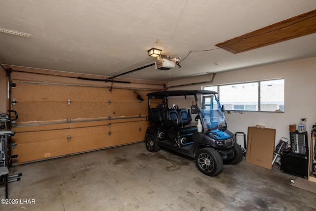 2593 Tradewind Dr, Lake Havasu City, AZ 86403 - garage featuring a garage door opener