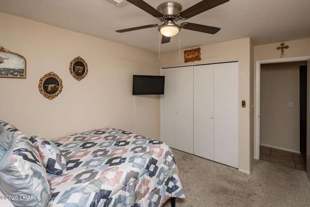 2593 Tradewind Dr, Lake Havasu City, AZ 86403 - bedroom featuring carpet flooring, a closet, and ceiling fan