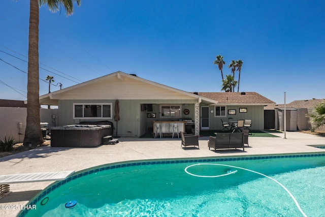 2593 Tradewind Dr, Lake Havasu City, AZ 86403 - view of pool with a hot tub, a patio, and central air condition unit