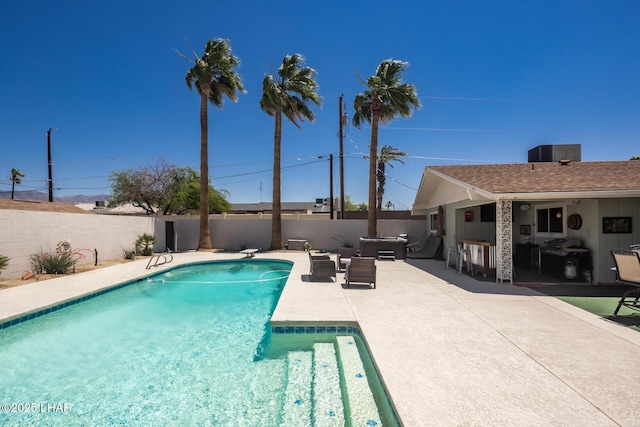 2593 Tradewind Dr, Lake Havasu City, AZ 86403 - view of swimming pool featuring a patio area and a fenced backyard