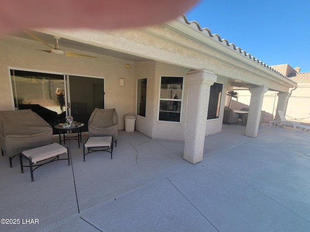 view of patio / terrace with a ceiling fan