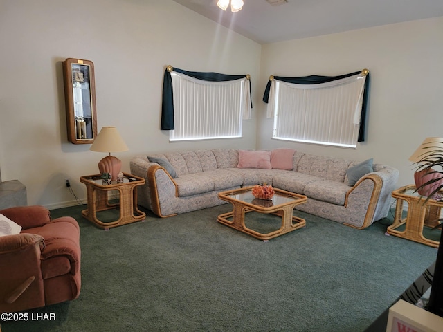 living room featuring vaulted ceiling and carpet flooring