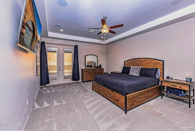 4718 N Banyan Ct, Lake Havasu City, AZ 86404 - bedroom featuring carpet flooring, access to outside, french doors, and a raised ceiling