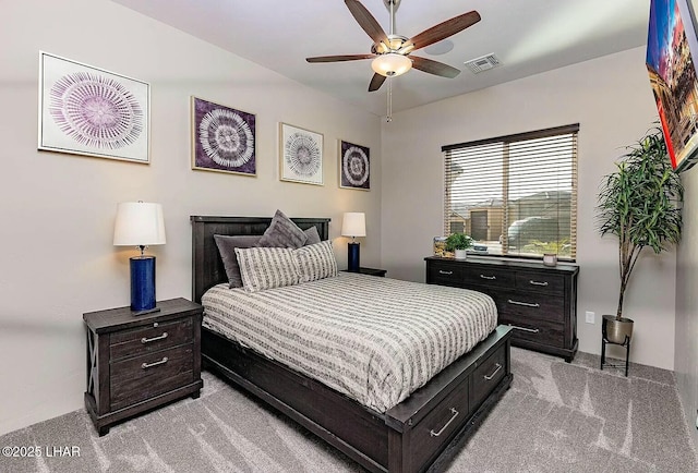 4718 N Banyan Ct, Lake Havasu City, AZ 86404 - bedroom featuring ceiling fan, visible vents, and light carpet