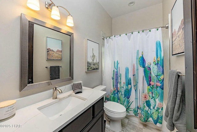 4718 N Banyan Ct, Lake Havasu City, AZ 86404 - bathroom featuring curtained shower, toilet, and vanity