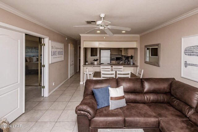 777 Harrah Way Unit 512, Lake Havasu City, AZ 86403 - living room featuring visible vents, ornamental molding, ceiling fan, recessed lighting, and light tile patterned floors