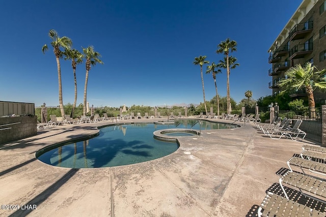 777 Harrah Way Unit 512, Lake Havasu City, AZ 86403 - pool with a patio, a community hot tub, and fence