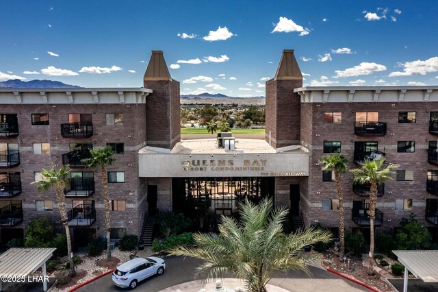 view of building exterior with a mountain view