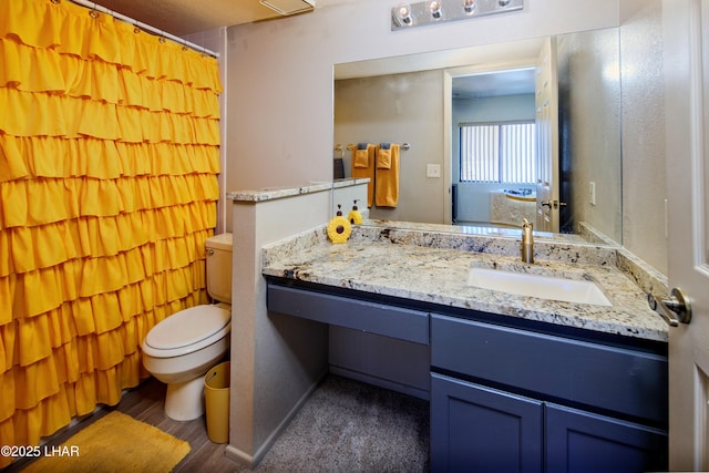 full bath featuring wood finished floors, vanity, toilet, and a shower with shower curtain
