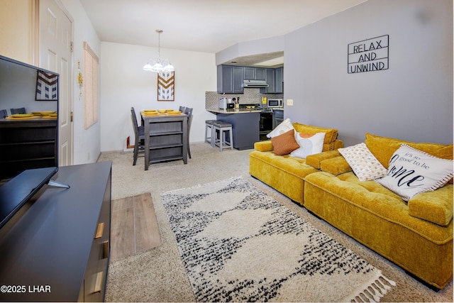 living room featuring a chandelier