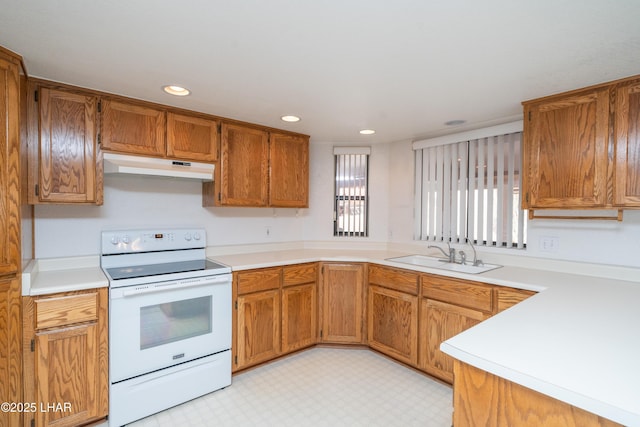 kitchen with white electric range and sink