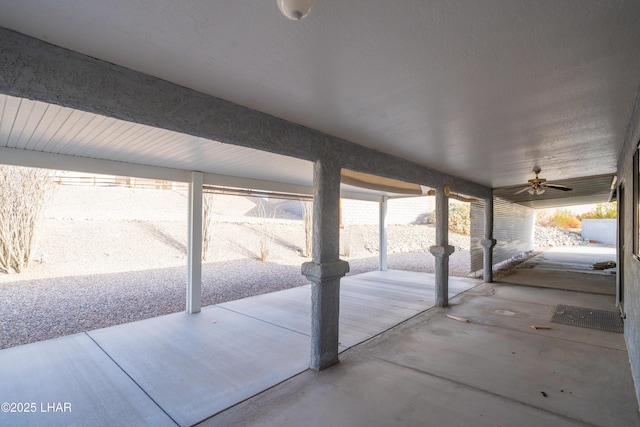 view of patio featuring ceiling fan