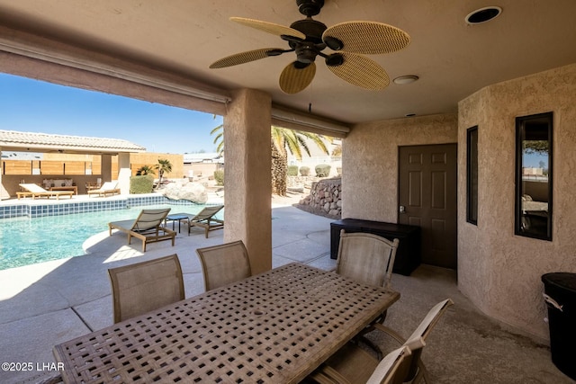 view of patio / terrace with an outdoor pool, outdoor dining area, a ceiling fan, and outdoor lounge area