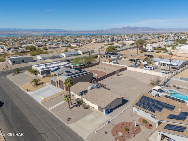 birds eye view of property with a residential view and a mountain view