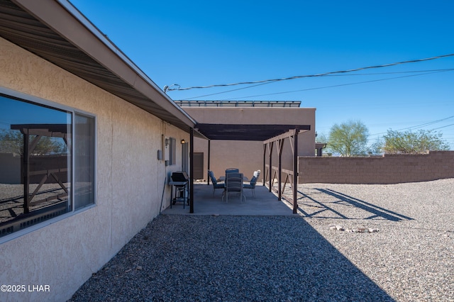 view of patio with fence