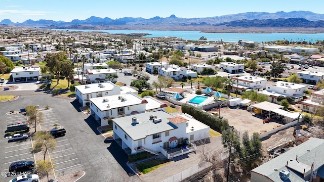 aerial view featuring a residential view and a water and mountain view