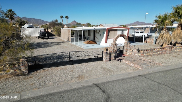 view of front of home with a mountain view