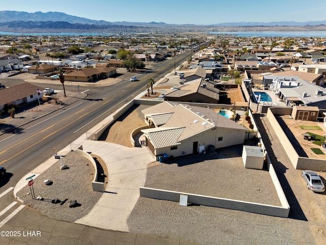 drone / aerial view featuring a mountain view