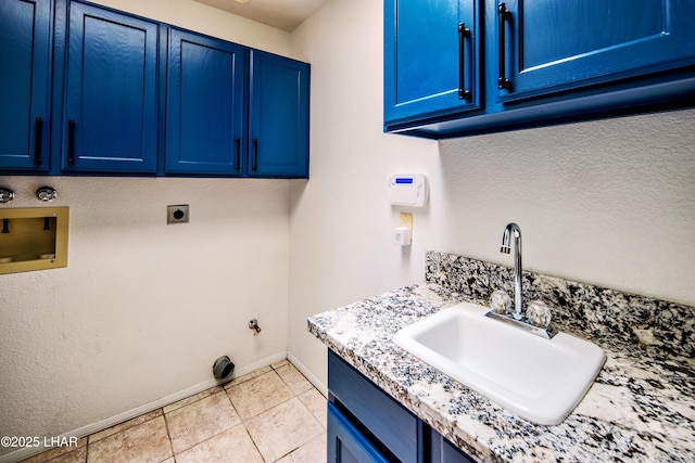 washroom featuring cabinets, hookup for a washing machine, sink, and electric dryer hookup