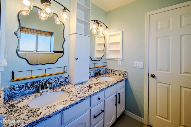 bathroom with vanity and tile patterned flooring