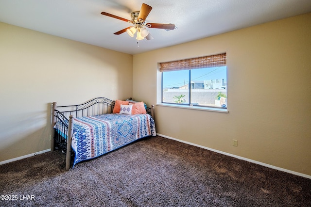 bedroom featuring ceiling fan and carpet flooring