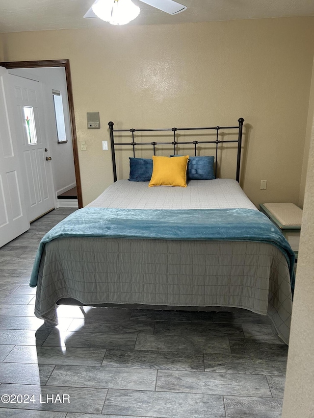 bedroom with wood-type flooring