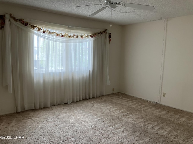 1755 Los Lagos Dr Unit D, Lake Havasu City, AZ 86403 - carpeted spare room featuring a ceiling fan and a textured ceiling
