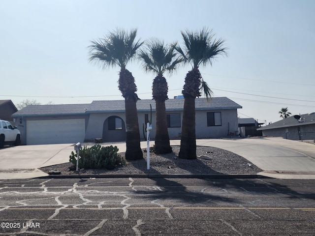 3098 Mcculloch Blvd N, Lake Havasu City, AZ 86403 - single story home with an attached garage, stucco siding, and driveway