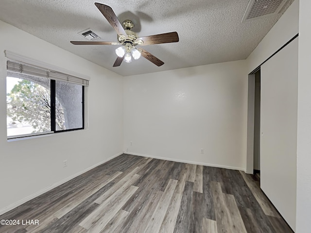 3098 Mcculloch Blvd N, Lake Havasu City, AZ 86403 - unfurnished bedroom featuring visible vents, a textured ceiling, and wood finished floors