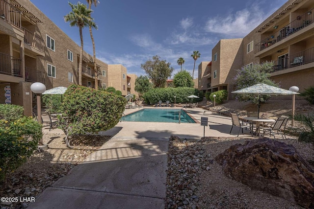 276 Lake Havasu Ave S Unit C31, Lake Havasu City, AZ 86403 - community pool featuring a patio and a residential view