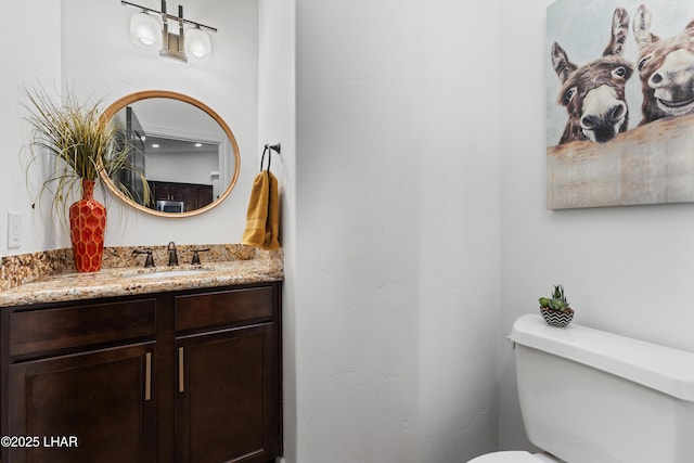 half bath with toilet and vanity