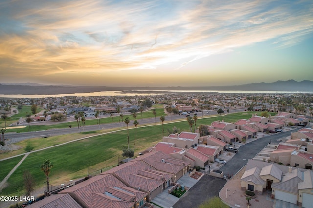 bird's eye view with a residential view and a mountain view