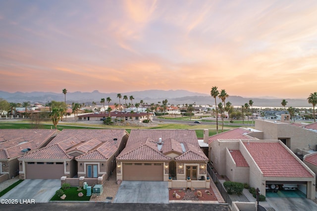 birds eye view of property featuring a residential view and a mountain view